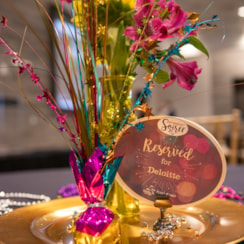 Colorful table display with reserved sign